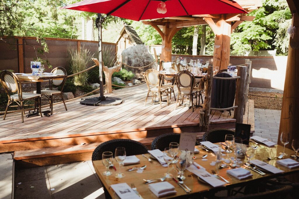 An outdoor restaurant wedding set-up with tables and chairs in Quebec