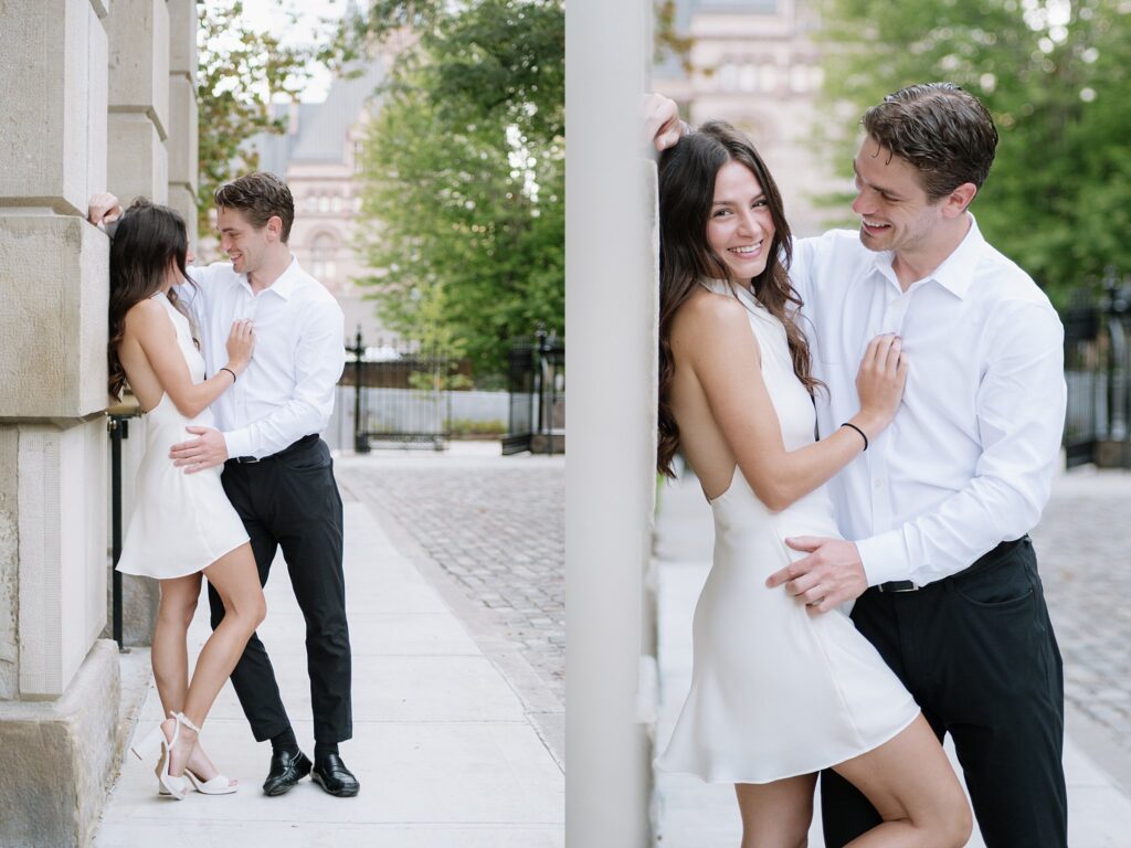 Couple taking engagement photos outside Osgoode Hall